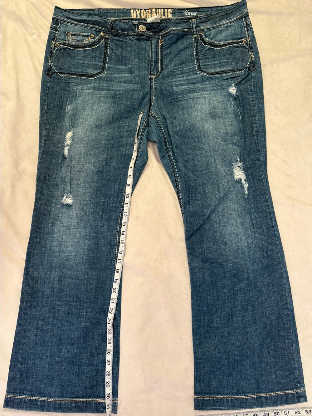 Hydraulic Distressed Bootcut Jeans